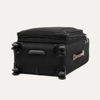 Side profile view of the Travelpro Platinum Elite Medium Check-In Spinner in Heritage Black, highlighting the durable ballistic nylon construction, premium leather carry handle, and smooth-rolling spinner wheels.