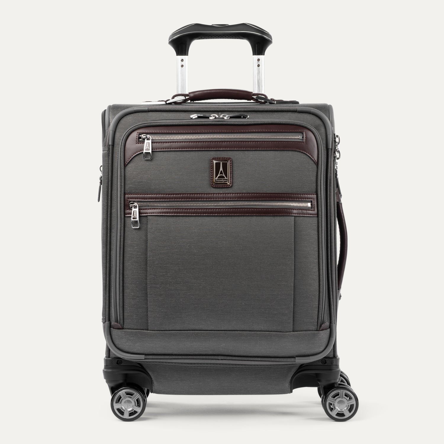 Front view of Travelpro® Platinum Elite International Carry-On Expandable Spinner in Vintage Grey, with dual exterior zip pockets and leather trim.

