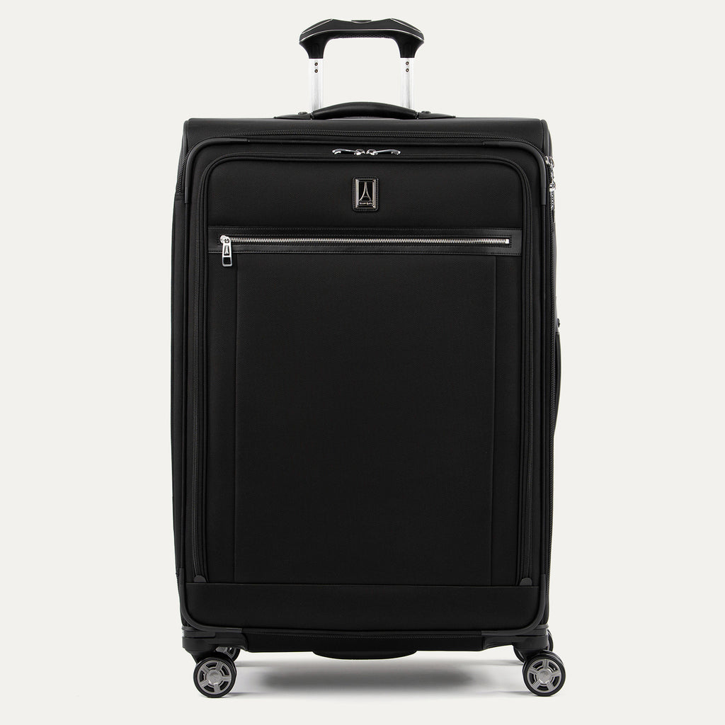 Front-facing Travelpro Platinum Elite Large Expandable Spinner in Shadow Black, with streamlined front zipper pocket.
