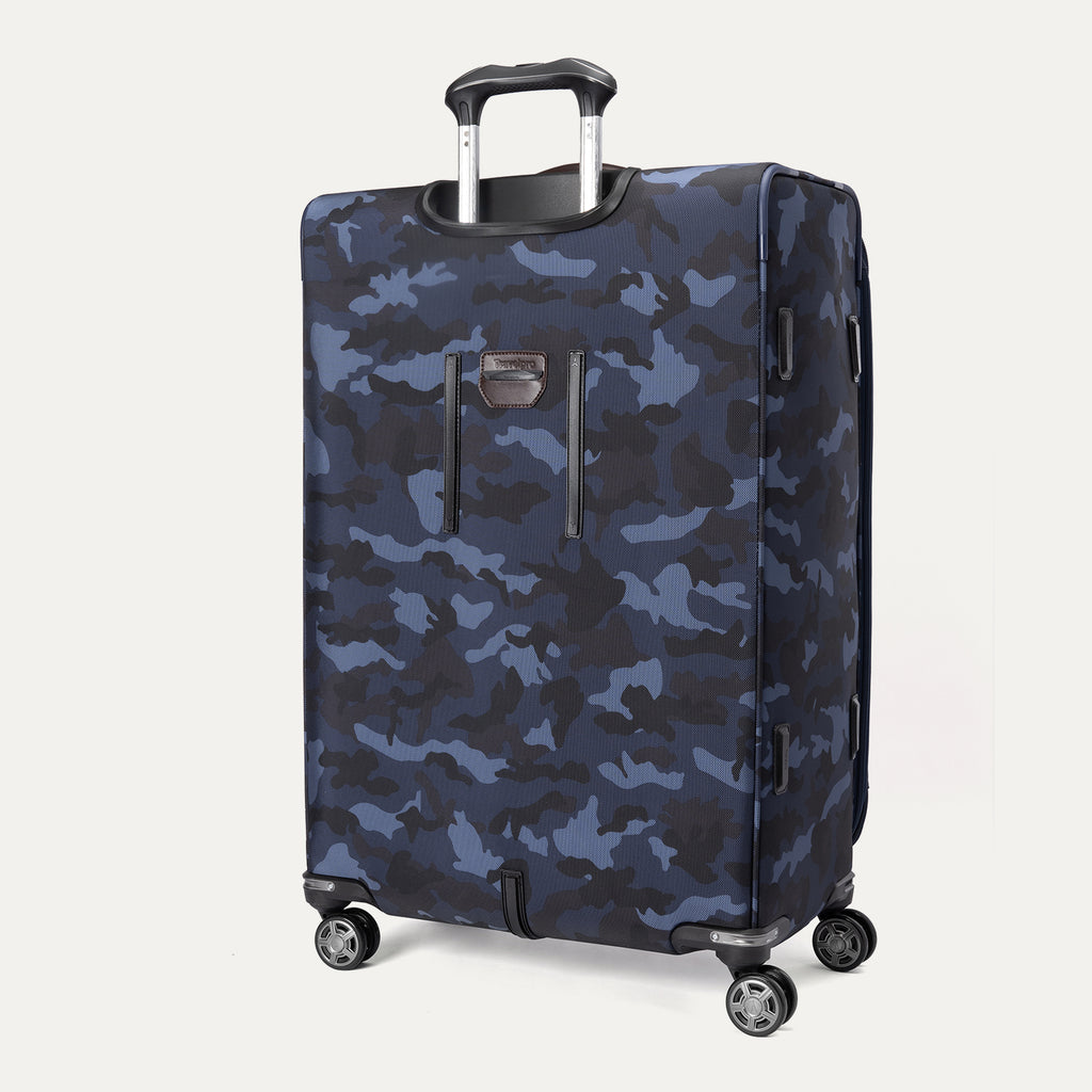 **Alt text:** Back view of Platinum® Elite Large Check-In Spinner in Camouflage, featuring telescoping handle and spinner wheels.
