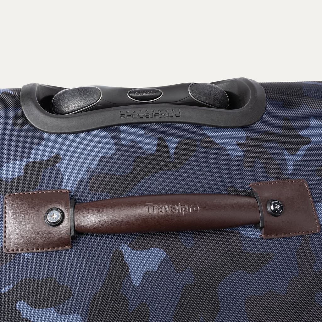 Close-up of top and leather carry handle on the Platinum® Elite Large Check-In Spinner in Camouflage.