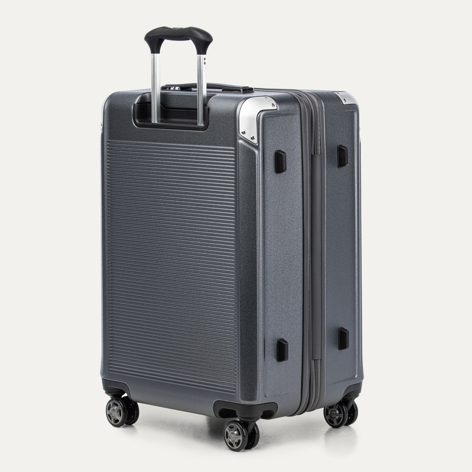 Gray suitcase with black wheels and handle on a white background