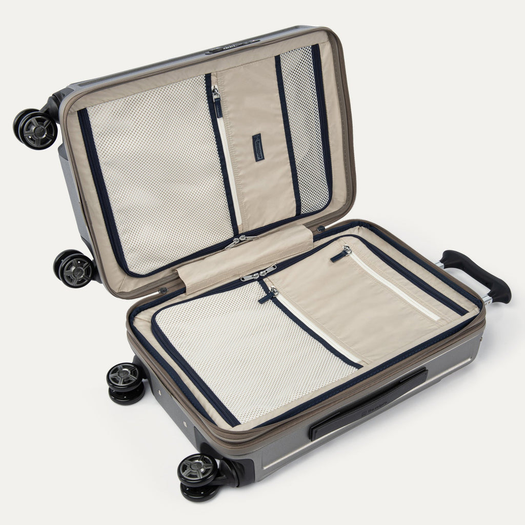 Open suitcase with black wheels on a white background