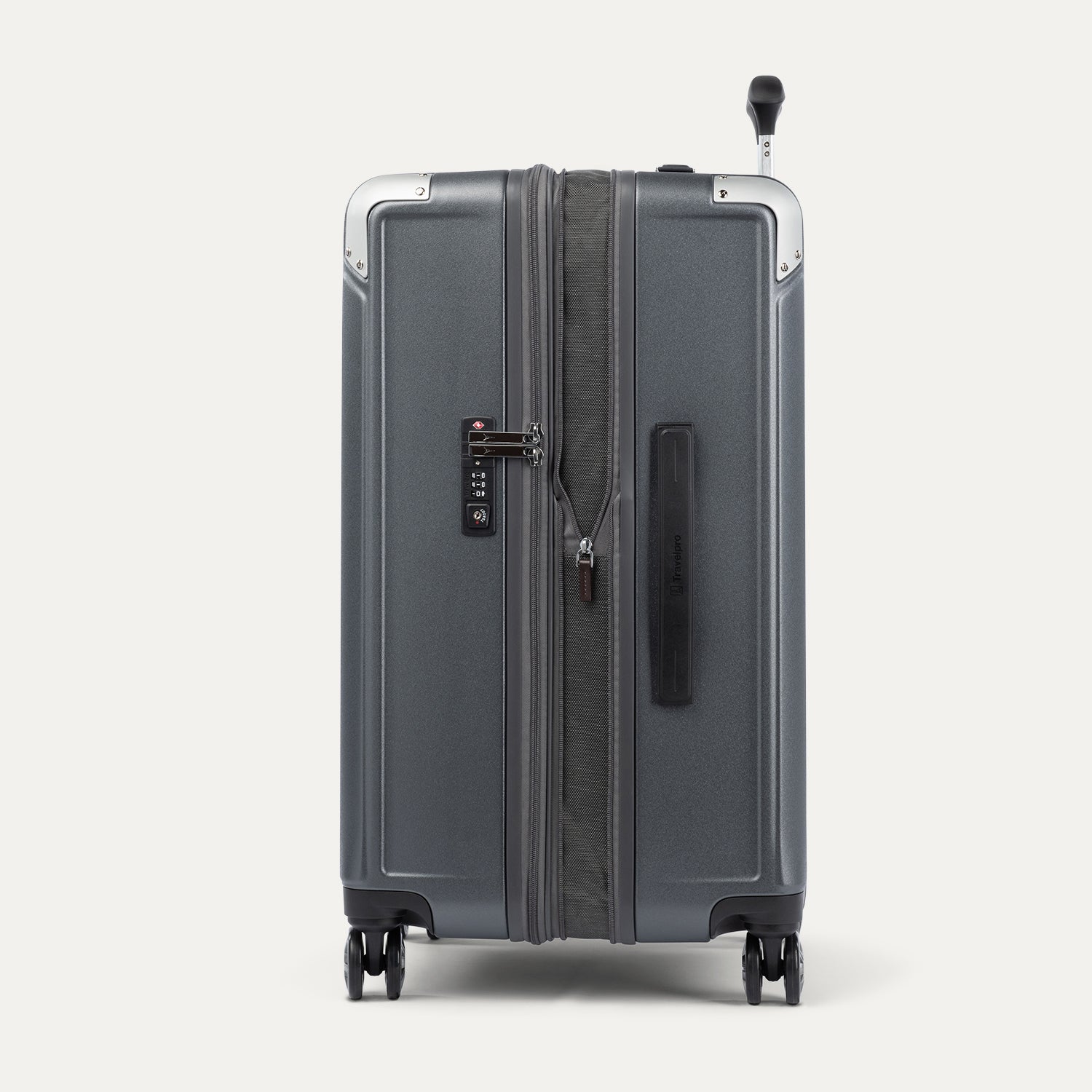 Side view of gray suitcase with expansion zipper open on a white background