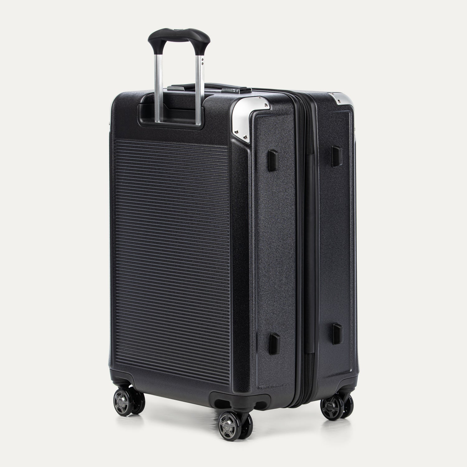 Black suitcase with handle and wheels on a white background