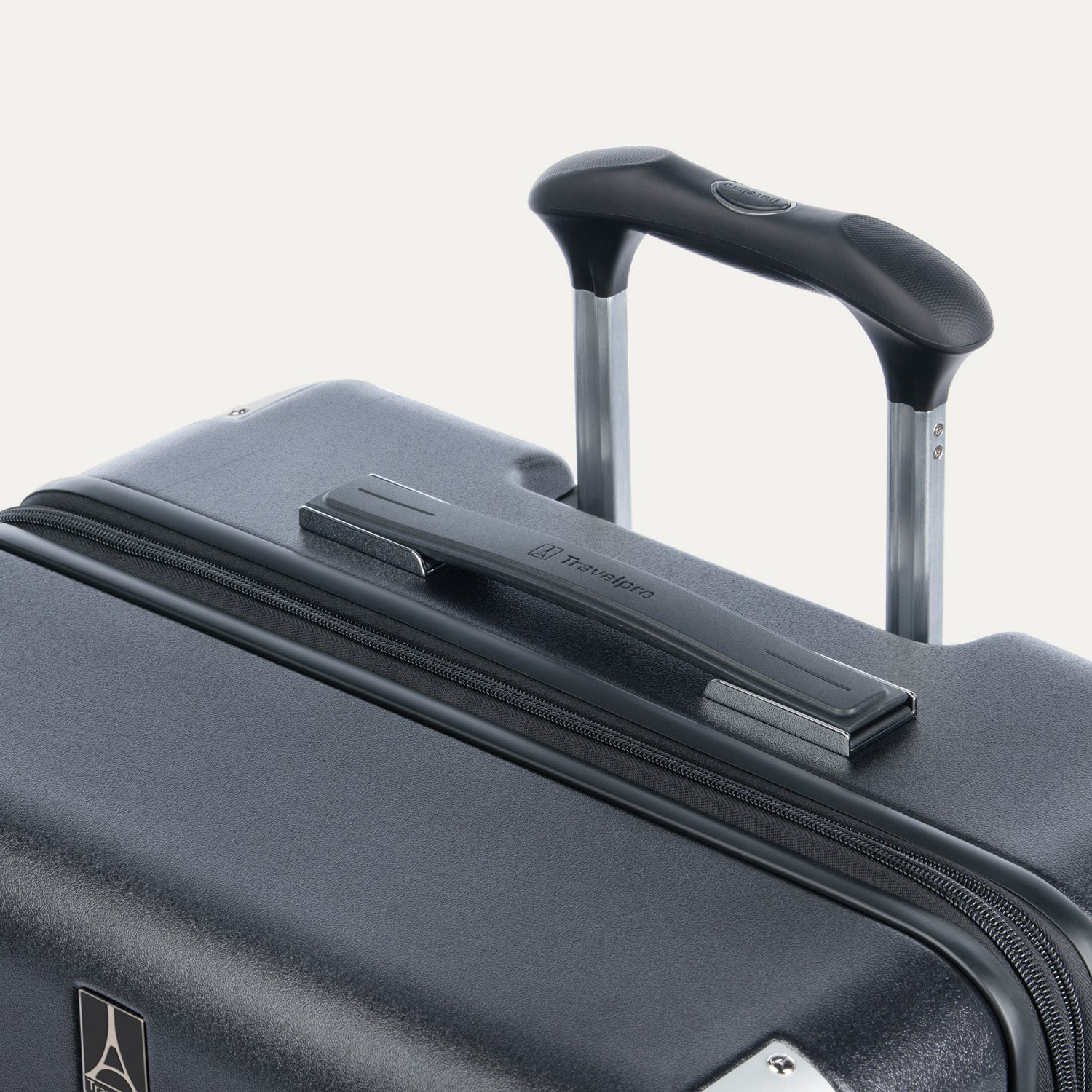 Close-up look of suitcase with handle on a white background