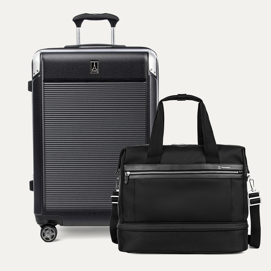 Black suitcase and duffel bag on a white background