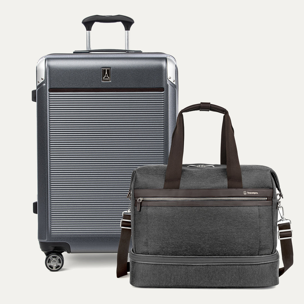 Gray suitcase and duffel bag with handle on a white background