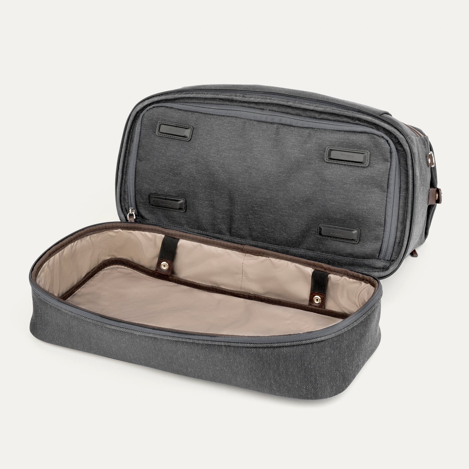 Grey weekender shoe compartment open on a white background