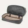 Grey weekender shoe compartment open on a white background