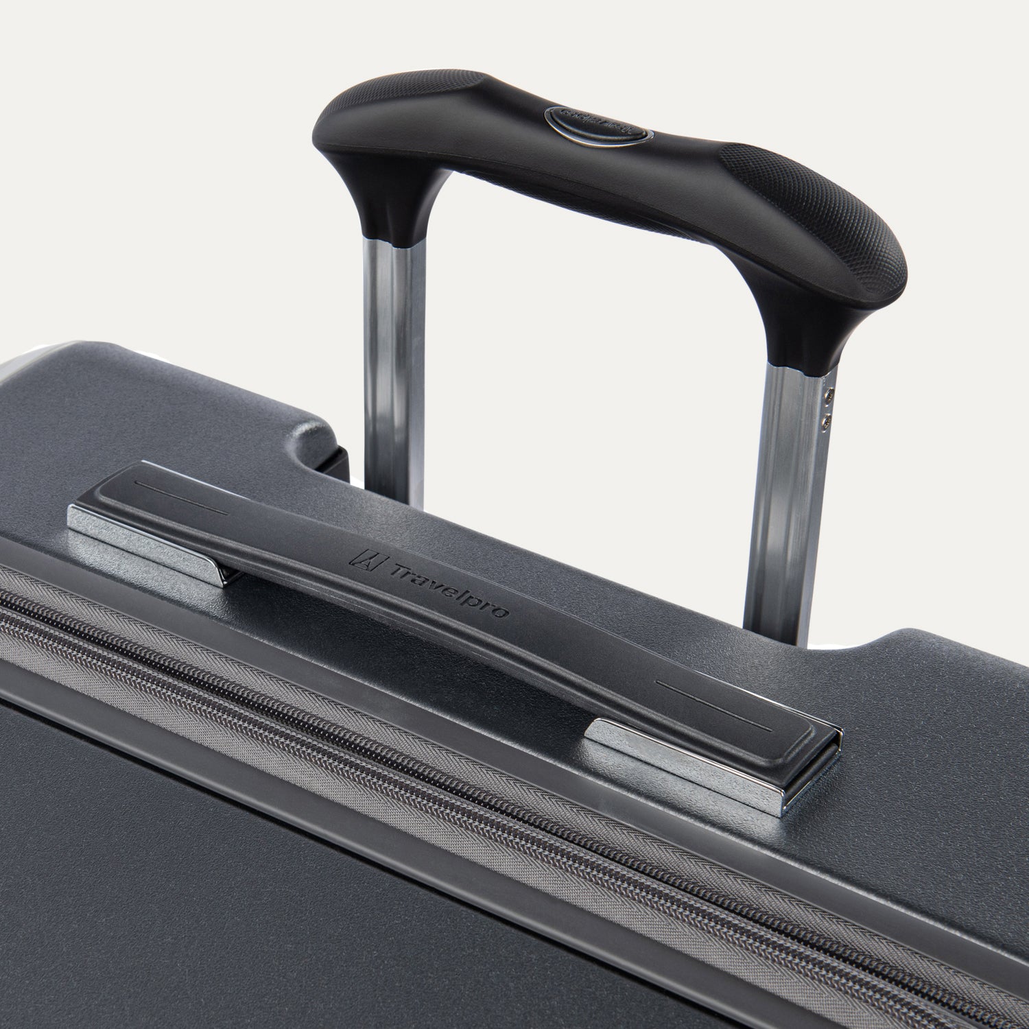 Close-up look of suitcase handle on a white background