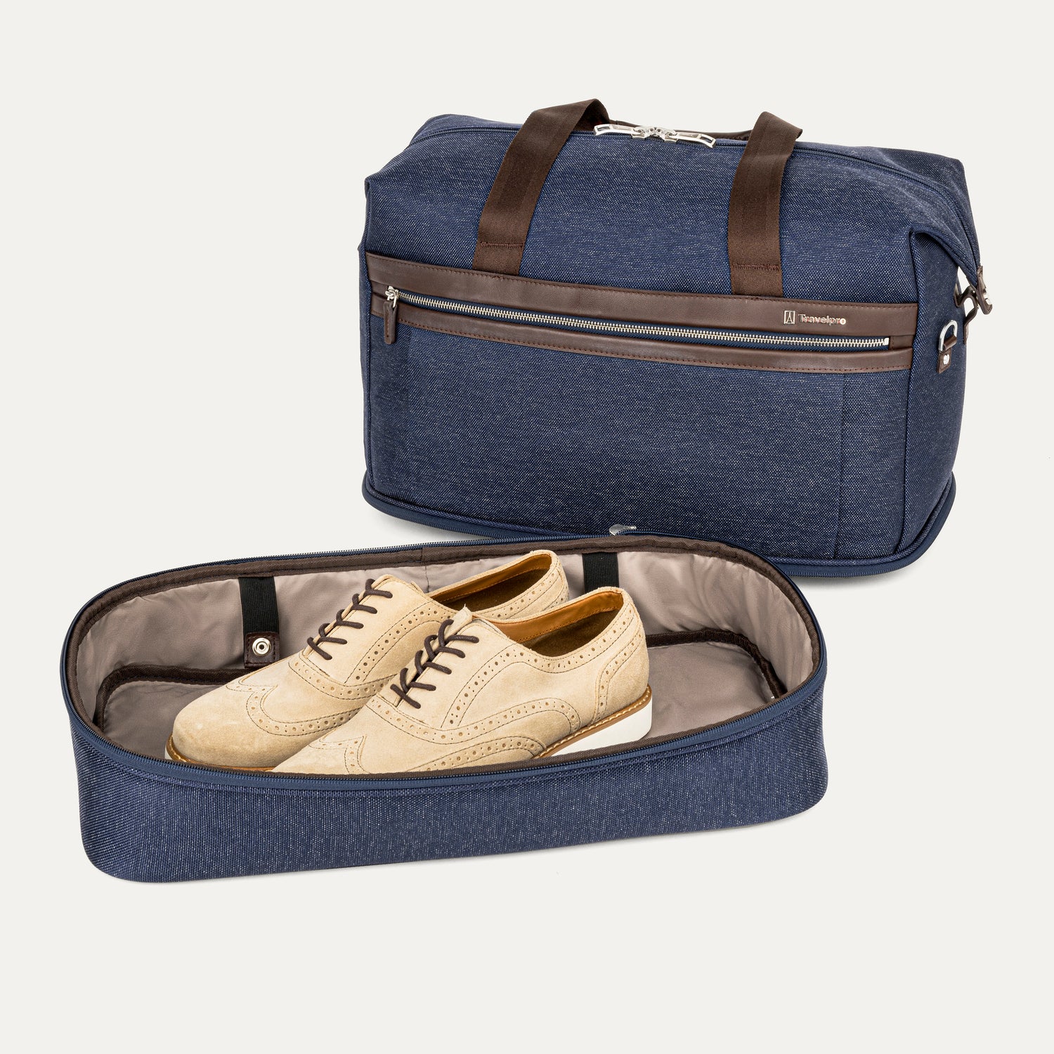 True navy weekender with detached shoe compartment on white background 