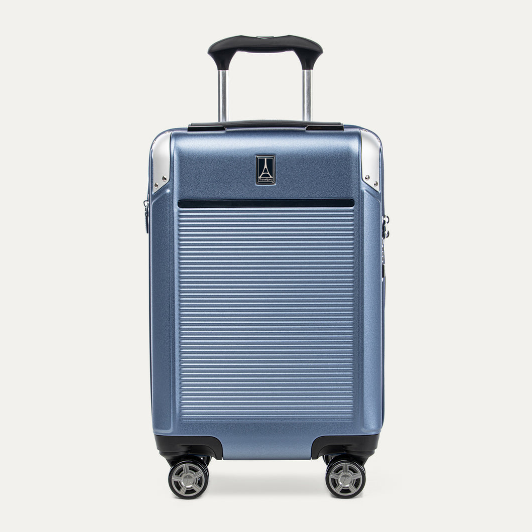 Front view of Travelpro Platinum Elite Compact Carry-On Hardside Spinner in Dark Sky Blue, featuring an ultra-strong aluminum shell and extension handle.
