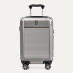 Front view of Travelpro Platinum Elite Compact Carry-On Hardside Spinner in Metallic Sand, featuring a durable aluminum shell and extension handle.
