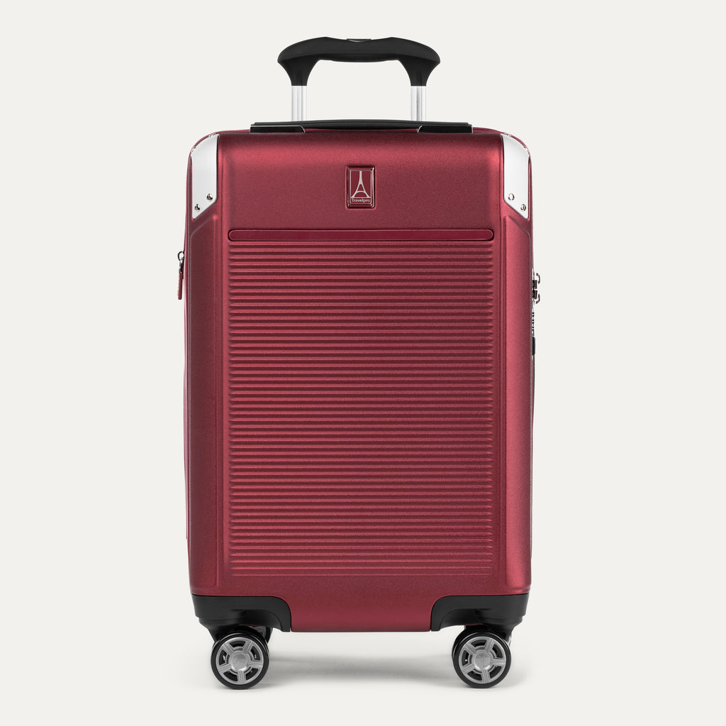 Front view of Travelpro Platinum® Elite Hardside Carry-On Expandable Spinner in Daring Red, featuring a textured polycarbonate shell and chrome corner guards.
