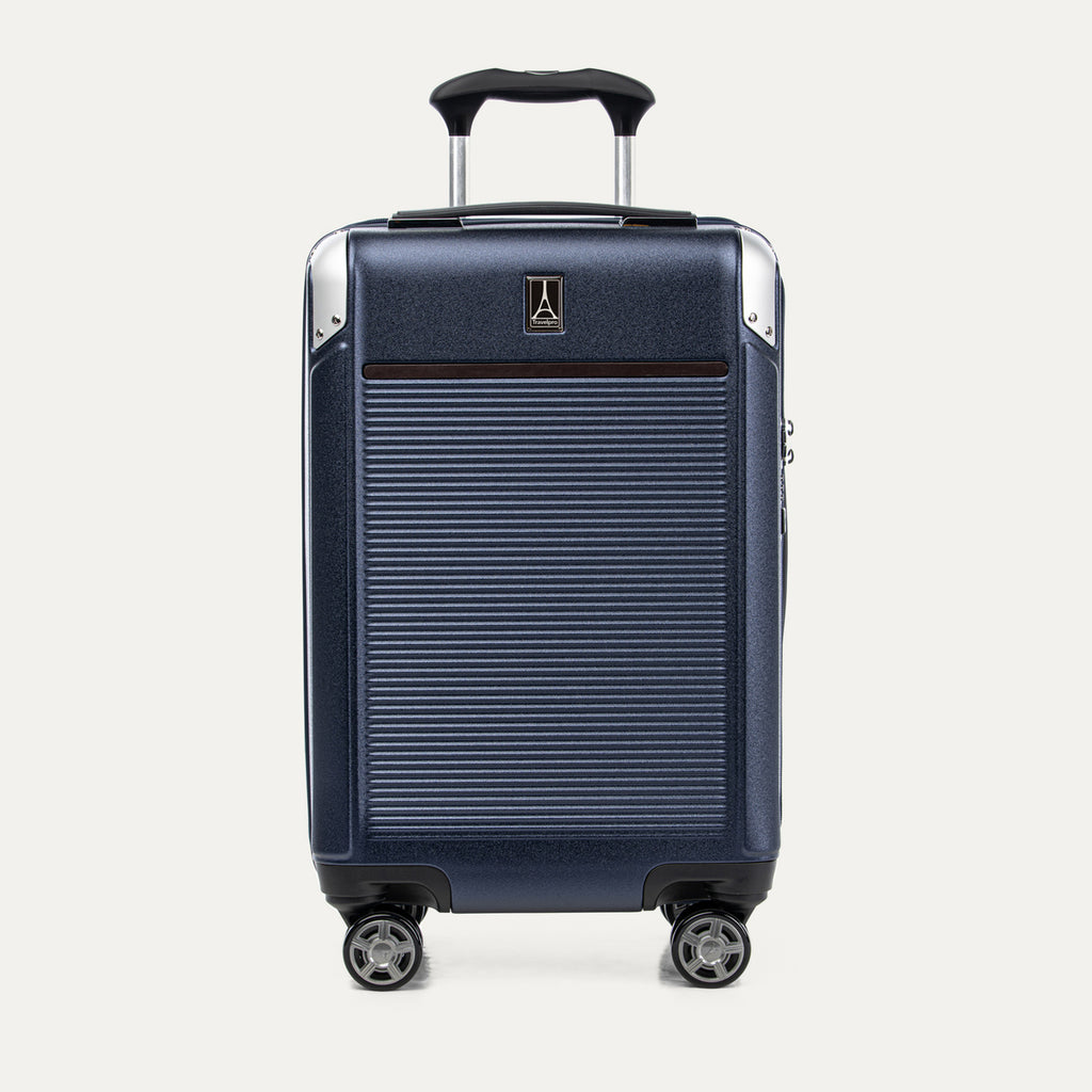 Front view of Travelpro Platinum Elite Carry-On Hardside Spinner in True Navy, featuring an ultra-strong aluminum shell and extension handle.


