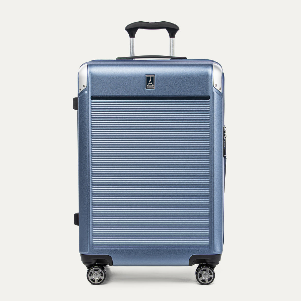 Front view of Travelpro Platinum® Elite Hardside Medium Check-In Expandable Spinner in Dark Sky Blue, featuring textured polycarbonate shell with chrome corner guards.
