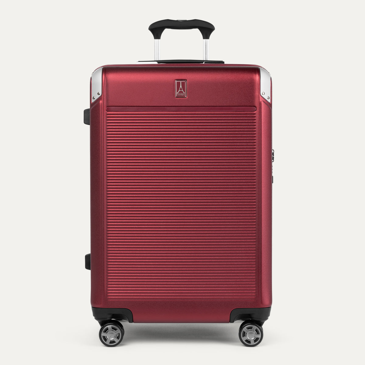 Front view of Travelpro Platinum® Elite Hardside Medium Check-In Expandable Spinner in Daring Red, featuring textured polycarbonate shell with chrome corner guards.
