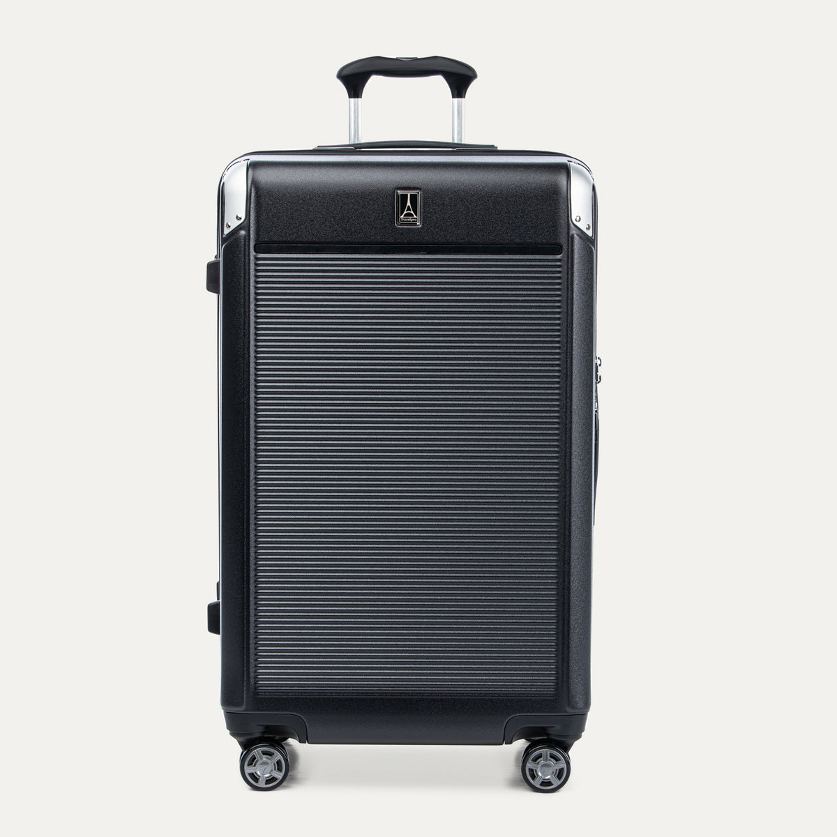 Front view of Travelpro Platinum® Elite Hardside Large Check-In Expandable Spinner in Jet Black, featuring grooved polycarbonate shell with chrome corner armor.
