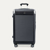 Front view of Travelpro Platinum® Elite Hardside Large Check-In Expandable Spinner in Jet Black, featuring grooved polycarbonate shell with chrome corner armor.
