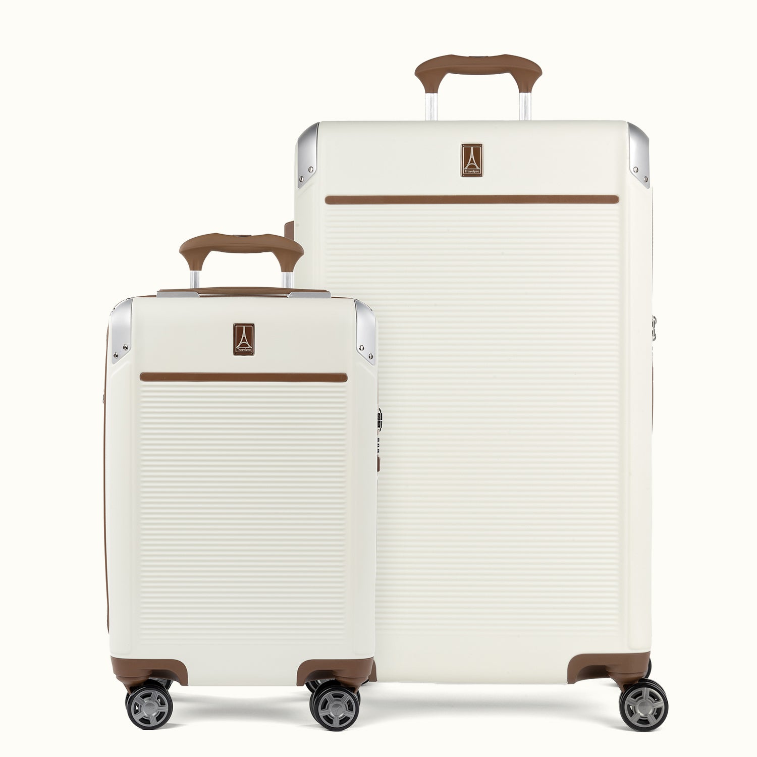 A set of two Platinum Elite hardside spinner suitcases in cream white color, including a carry-on and a larger check-in size, both with brown accents and aluminum corner armor.