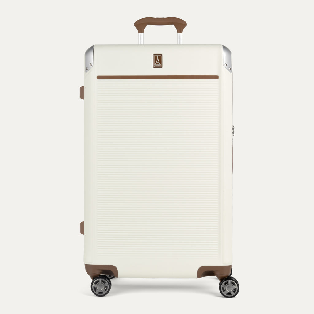 White suitcase with brown accents on a white background