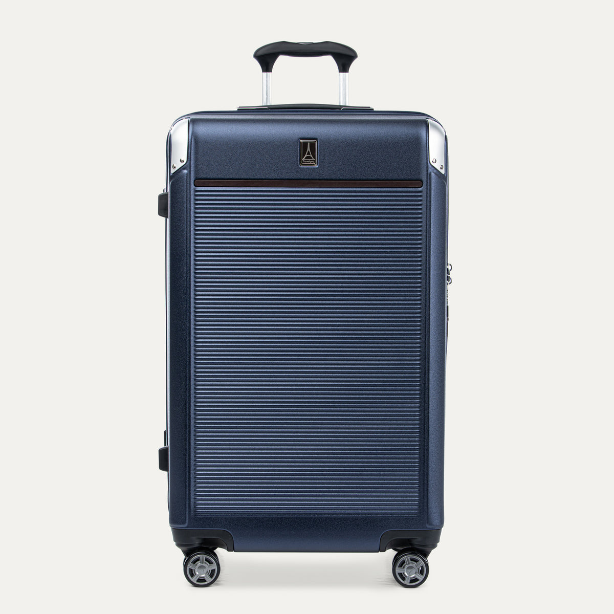 Front view of Travelpro Platinum Elite Large Check-In Expandable Hardside Spinner in True Navy, featuring a textured polycarbonate shell and PowerScope Extension Handle.