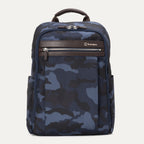 A Navy camouflage Travelpro Platinum Elite slim backpack with a leather top handle and YKK zippers.