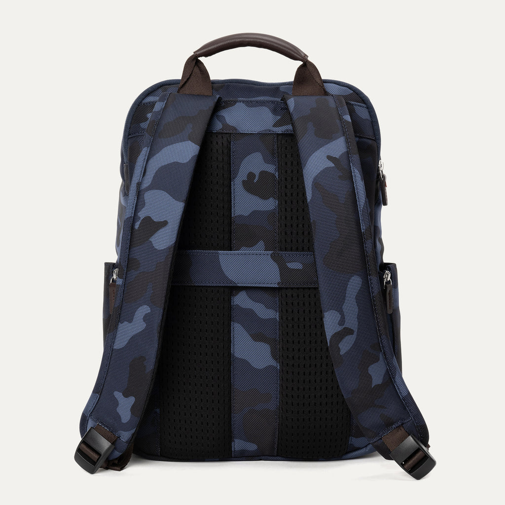 Rear view of Travelpro Platinum Elite Slim Backpack in Navy Camouflage with padded straps and rear stacking strap.
