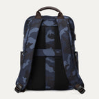 Rear view of Travelpro Platinum Elite Slim Backpack in Navy Camouflage with padded straps and rear stacking strap.
