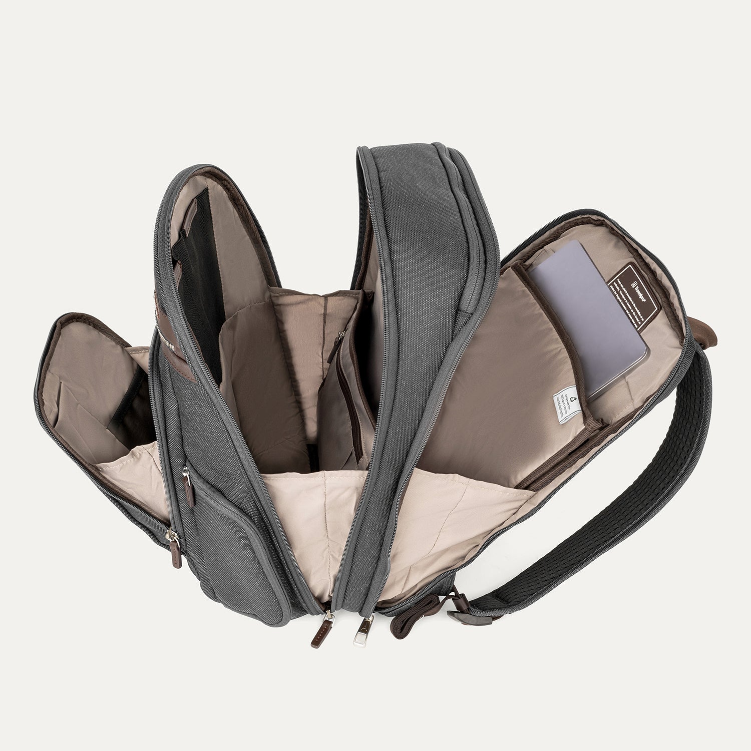 Interior view of Travelpro Platinum Elite Business Backpack in Vintage Grey, showing padded tech compartments and spacious organization.

