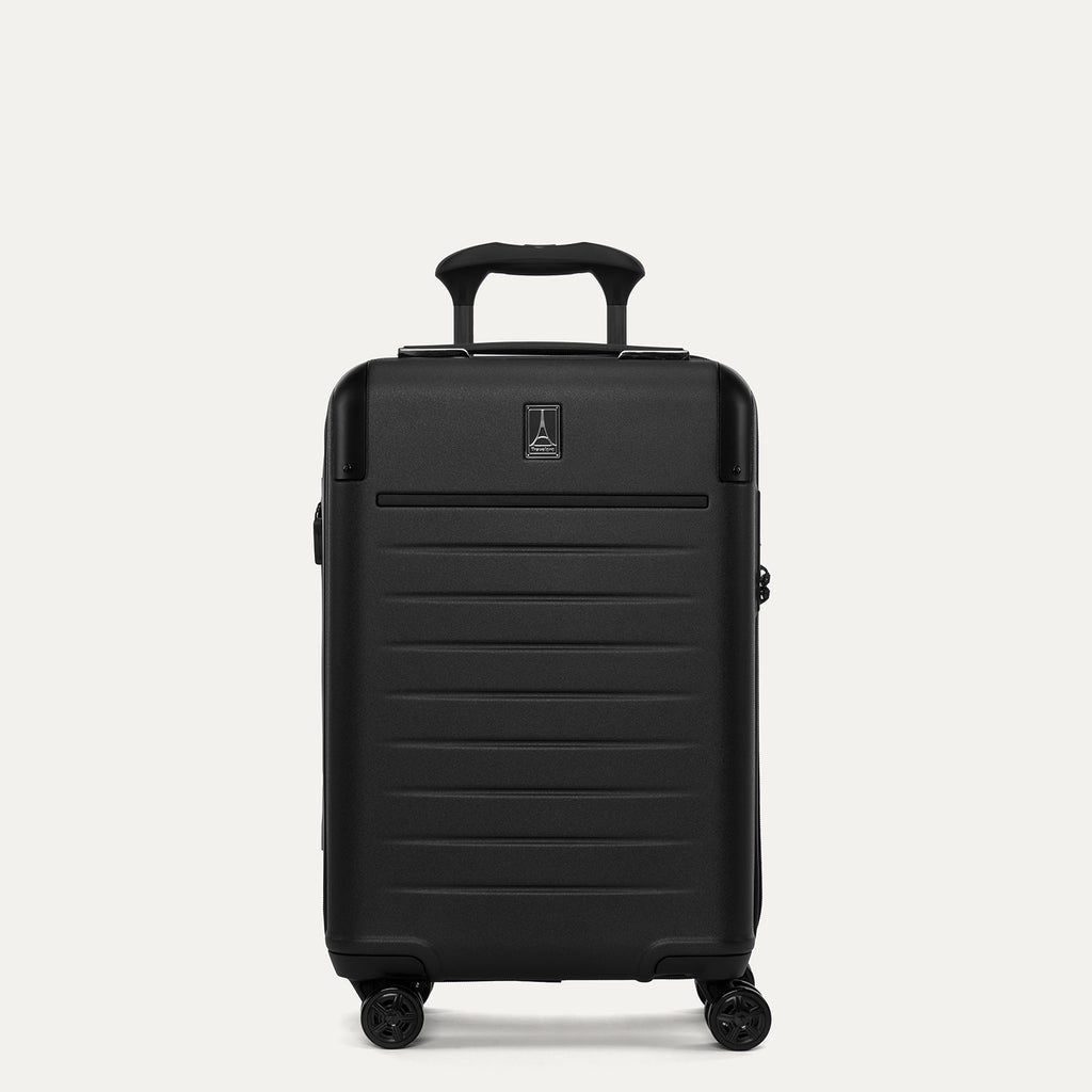 Black suitcase with wheels on a light gray background