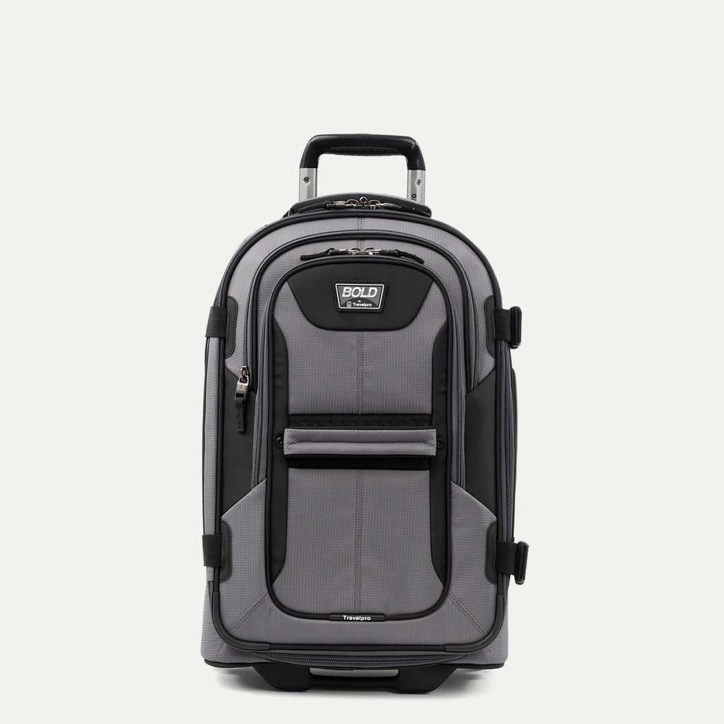 A gray and black Travelpro carry-on rollaboard luggage bag with telescopic handle, top and side carry handles