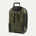 rear three-quarter view of the olive black bold by travelpro carry-on expandable rollaboard suitcase standing vertically, showing its protective skid guards, molded corner guards, reinforced wheel housings, two high-performance ball-bearing wheels, and extended telescoping handle.