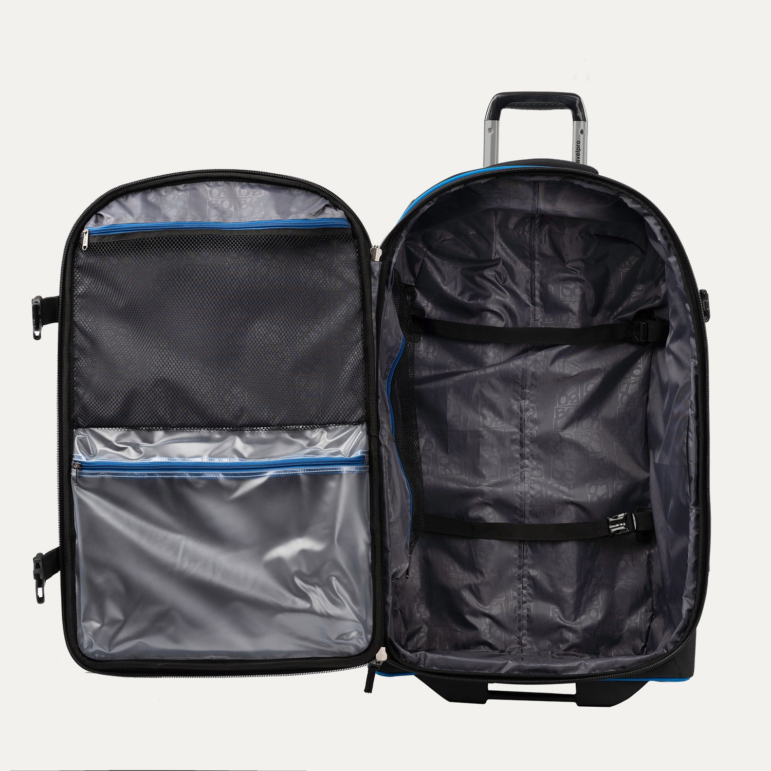 Interior view of the Travelpro® BOLD™ by Travelpro® Large Check-In in Blue Black, showing its spacious main compartment with adjustable hold-down straps, mesh zippered pocket, and a transparent zippered divider for organized packing.
