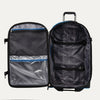 Interior view of the Travelpro® BOLD™ by Travelpro® Large Check-In in Blue Black, showing its spacious main compartment with adjustable hold-down straps, mesh zippered pocket, and a transparent zippered divider for organized packing.
