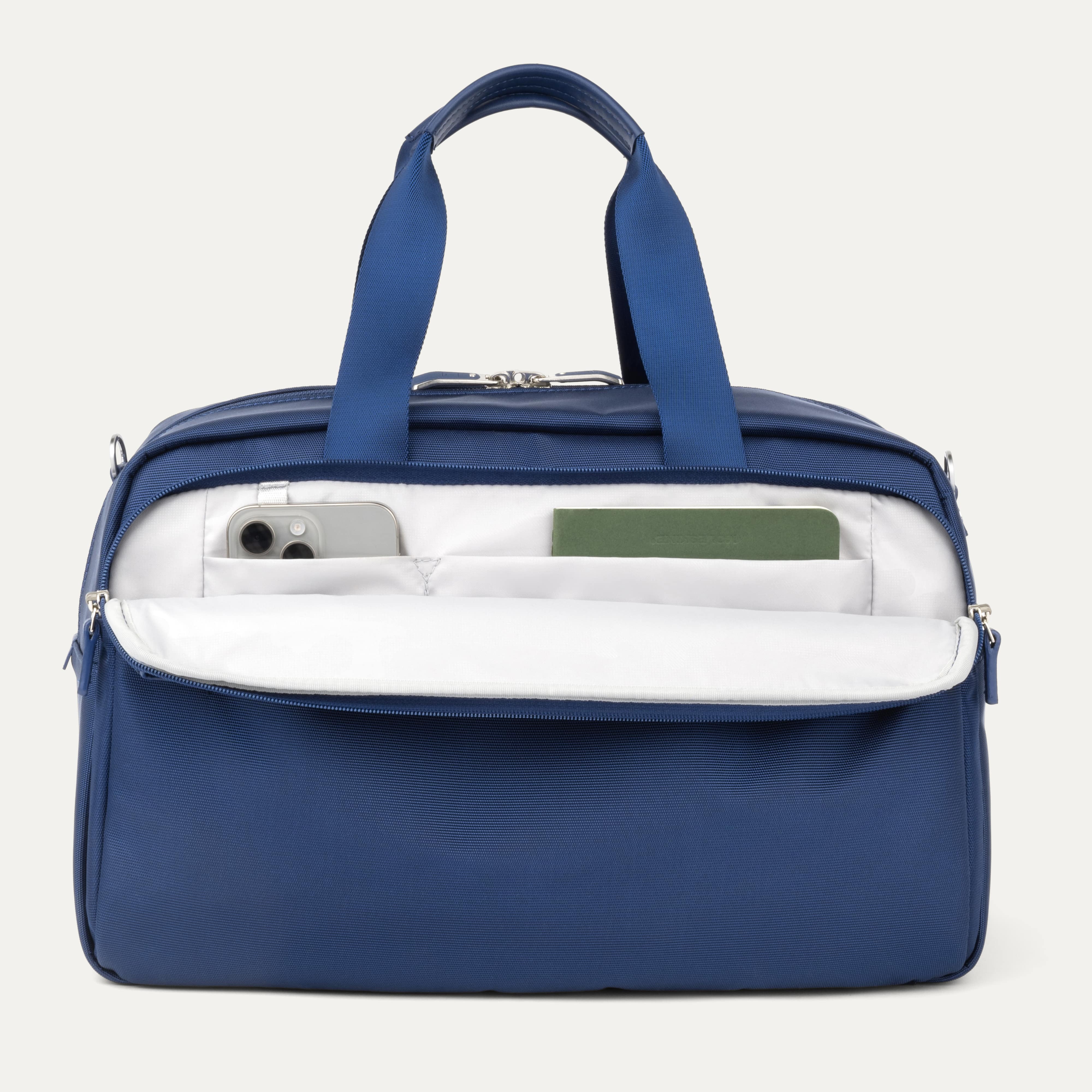 Front Pocket of VersaPack+ UnderSeat Travel Tote with Trolley Sleeve in Blue