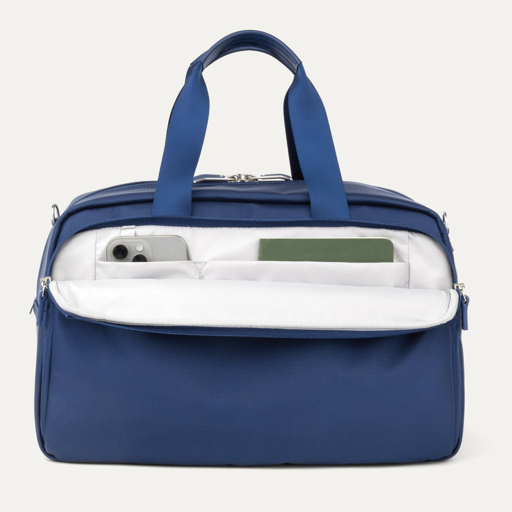 Front Pocket of VersaPack+ UnderSeat Travel Tote with Trolley Sleeve in Blue