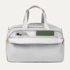 Front Pocket of VersaPack+ UnderSeat Travel Tote with Trolley Sleeve in Silver with Orange Trim