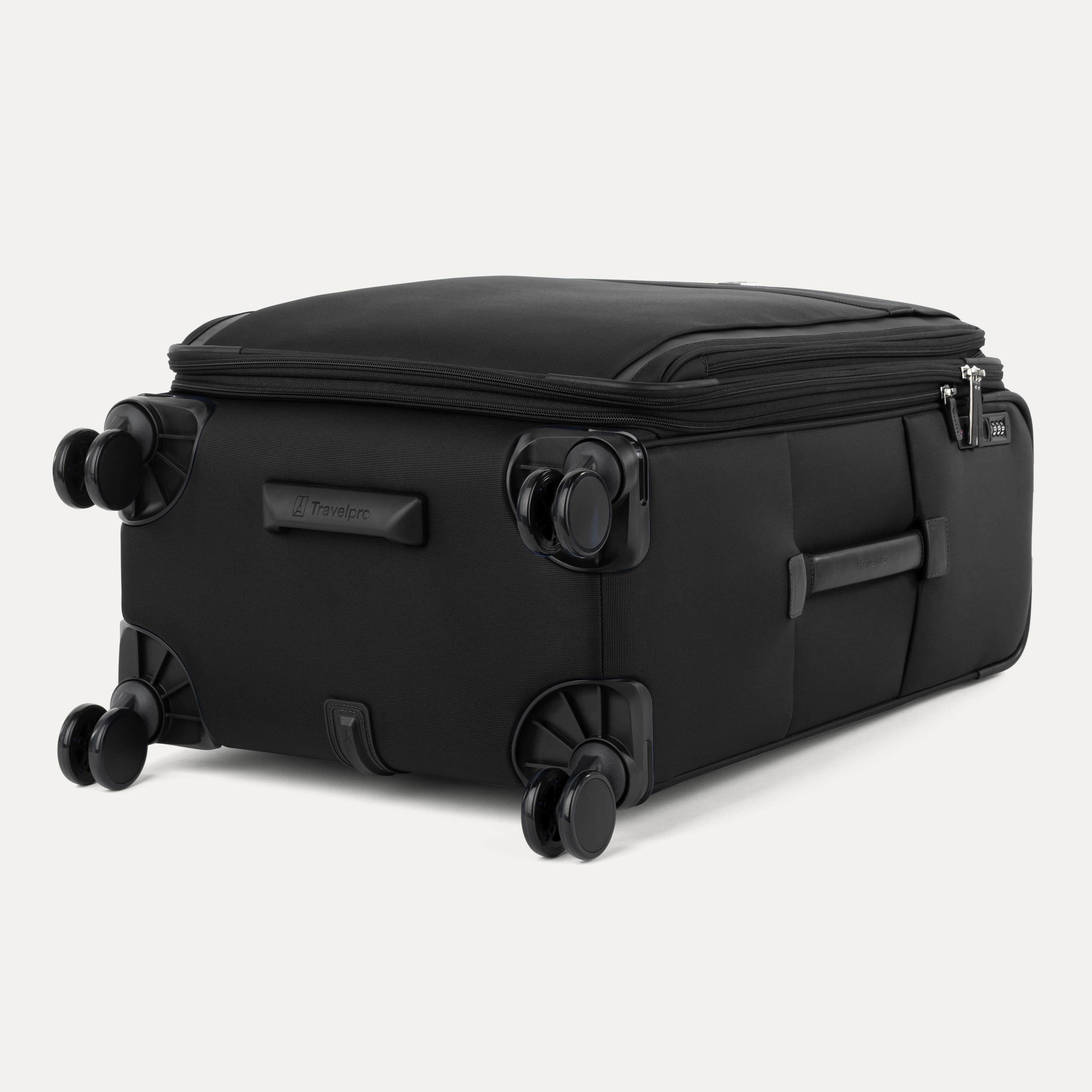 Bottom view of the Travelpro Versapack Checked Expandable Spinner in Black, showing 360° Spinner Wheels