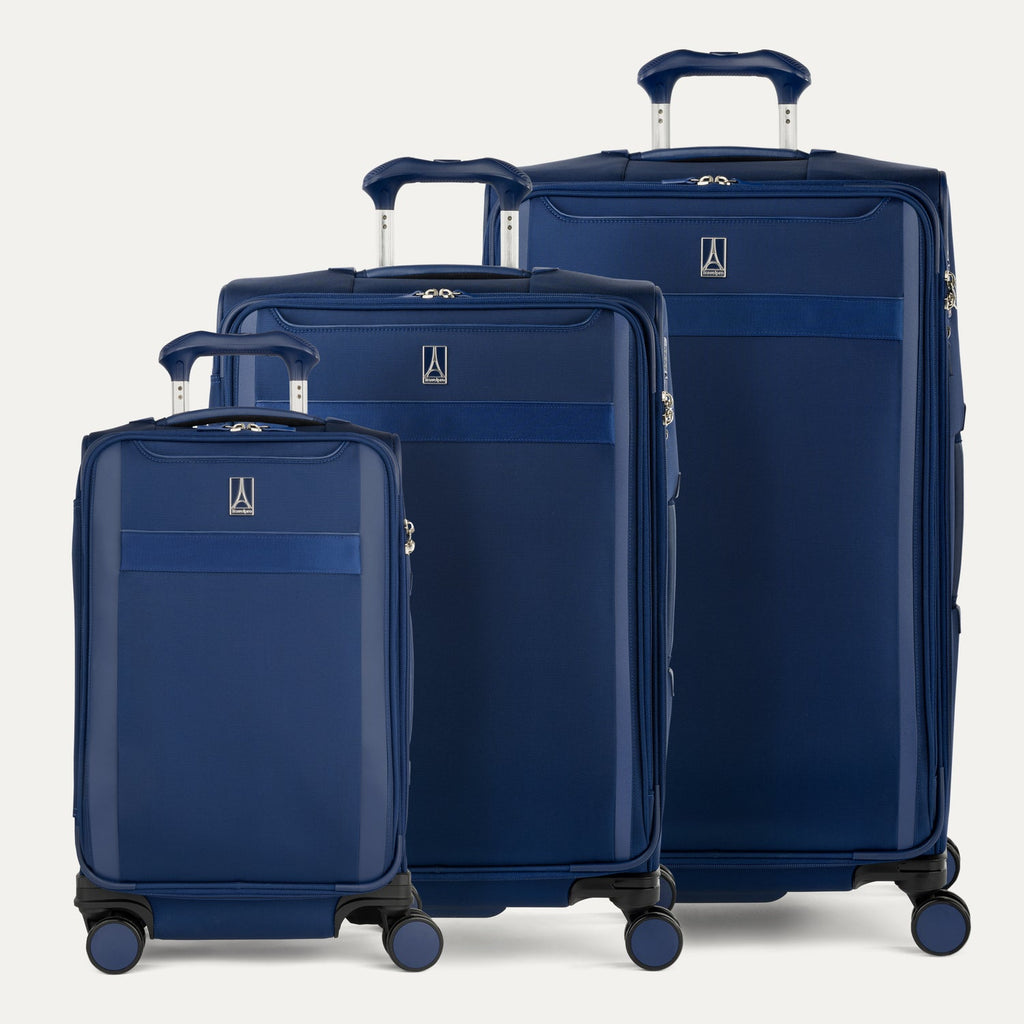 Front view of Travelpro Versapack Spinner set in Estate Blue, shown in Carry-On, Medium Checked, and Large Checked sizes.
