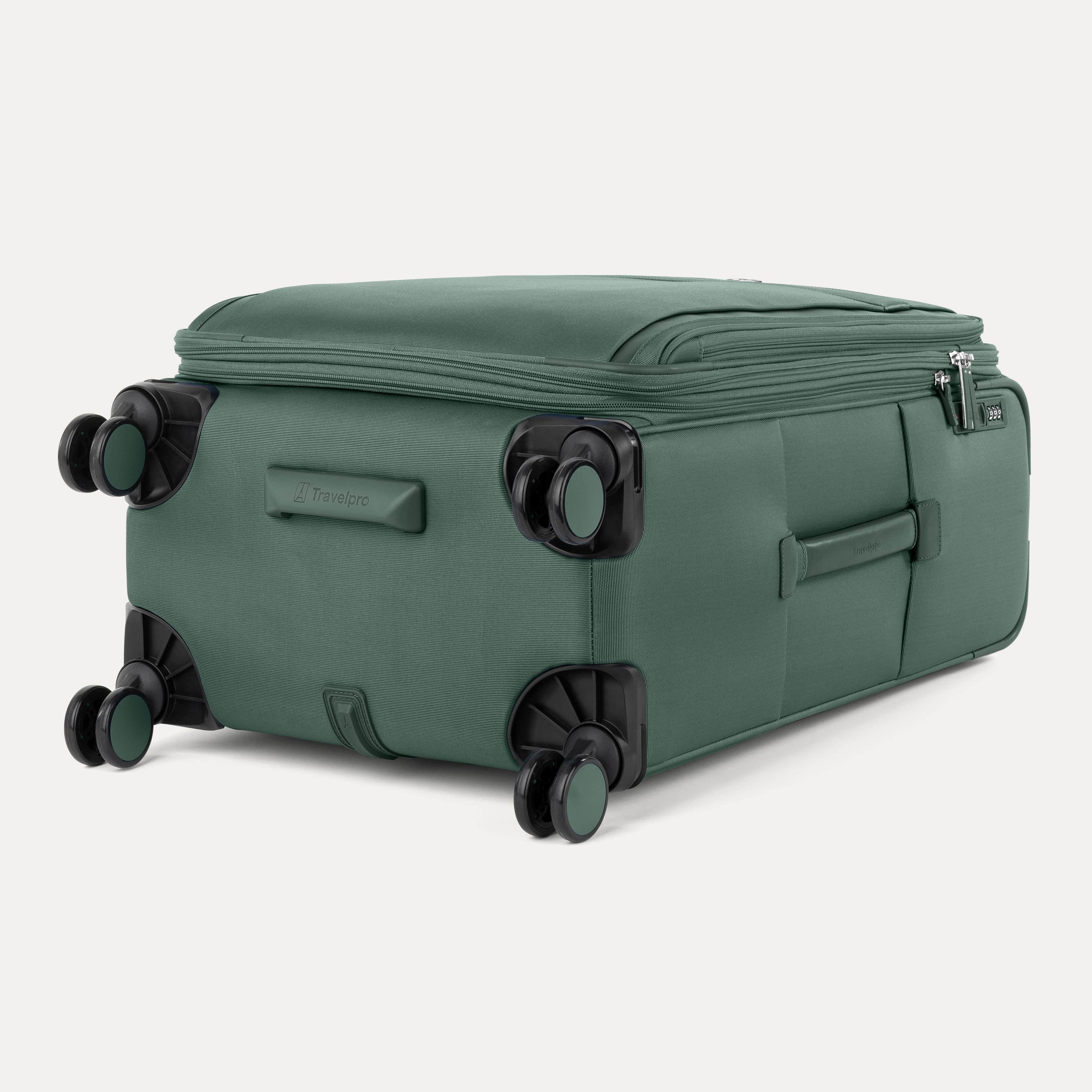 Bottom view of Travelpro Versapack Checked Expandable Spinner in Desert Sage Green, featuring 360° Spinner Wheels