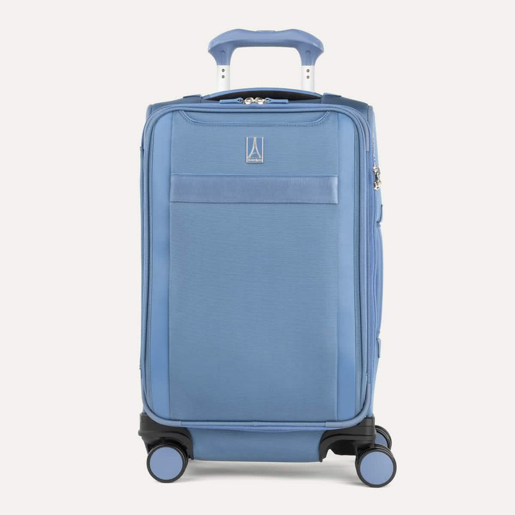 Front view of Travelpro Versapack+  Carry-On in Elemental Blue, featuring a PowerScope Extension Handle and 360° Spinner Wheels.
