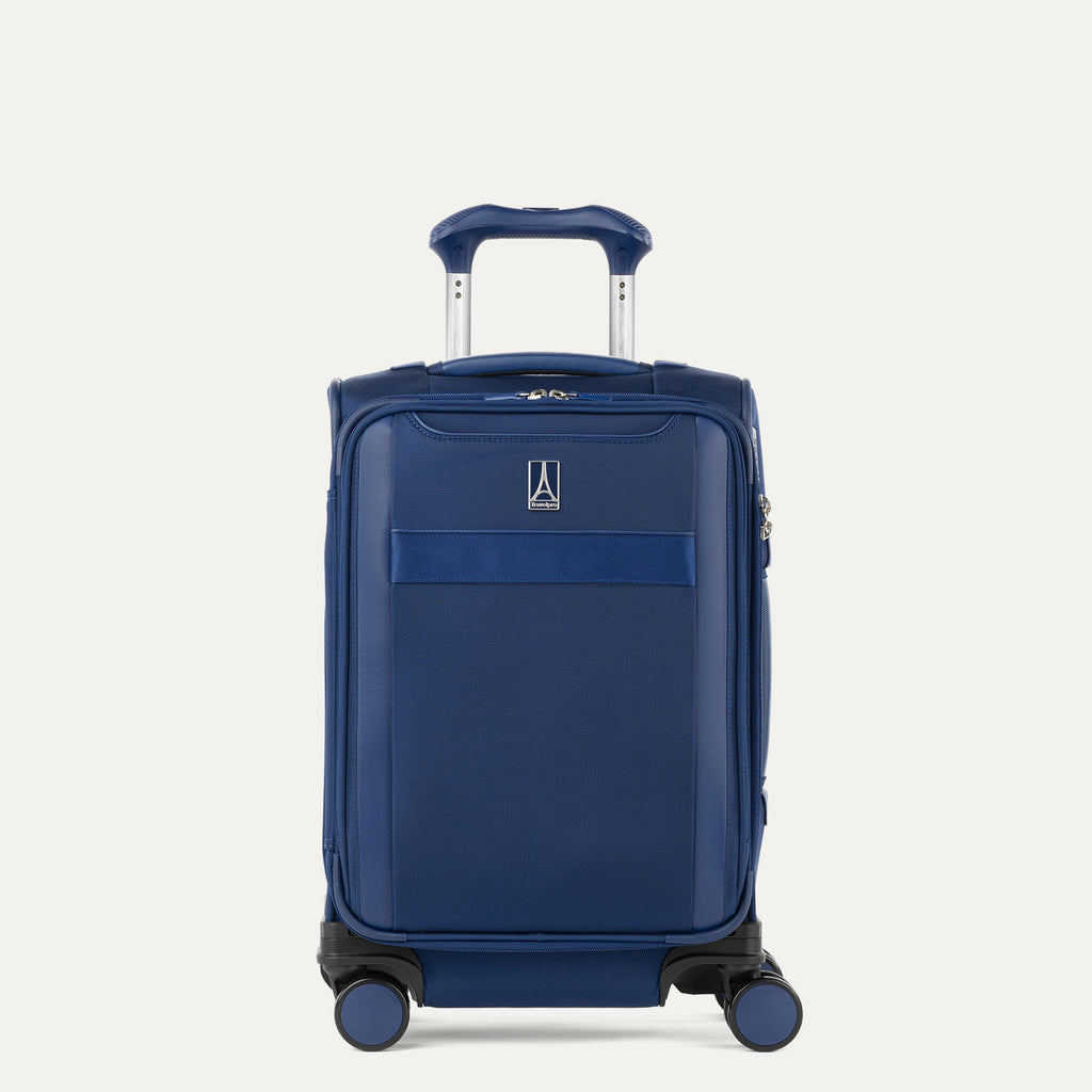 Front view of Travelpro Versapack+ Compact Carry-On Spinner in Estate Blue, featuring front document pocket and 360° Spinner Wheels.
