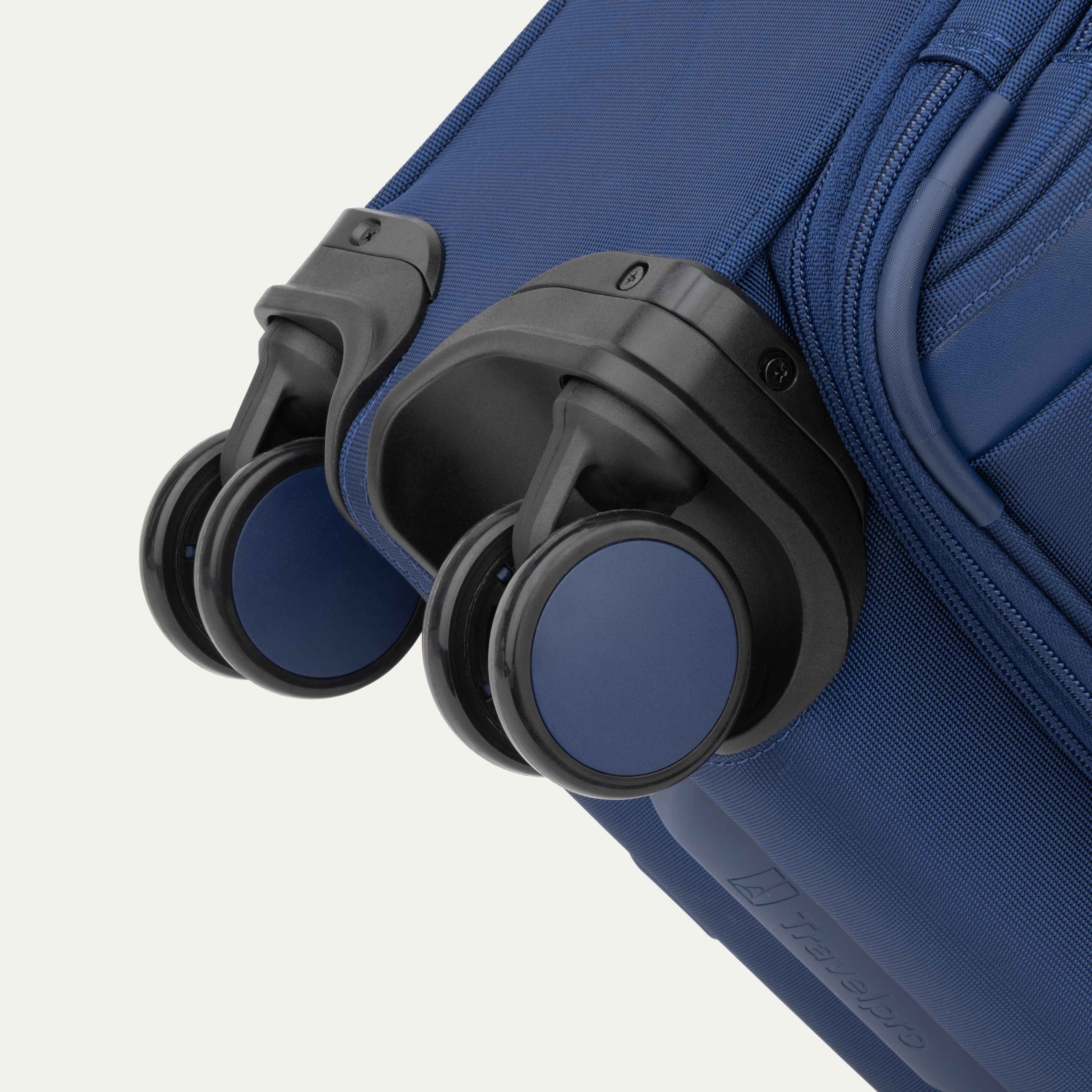 Self-Aligning Spinner Wheels of the Blue VersaPack+ Soft Sided Compact Small Carry-On Spinner