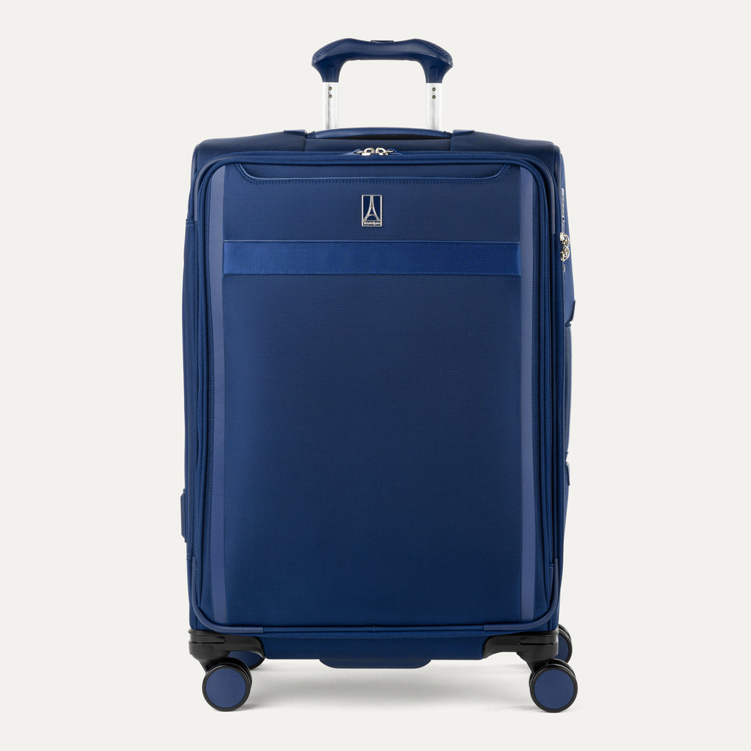 Front view of Travelpro Versapack+ Medium Check-In Spinner in Estate Blue, showing 360° spinner wheels and PowerScope Lite handle.
