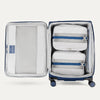 Interior of Blue VersaPack+ Medium Check-In Luggage Spinner with Removable Compression Packing Cubes