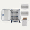 Water Resistant Interior of Blue VersaPack+ Medium Check-In Luggage Spinner with Removable Organizers and Laundry Bag