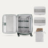 Water Resistant Interior of Green VersaPack+ Medium Check-In Luggage Spinner with Removable Organizers and Laundry Bag
