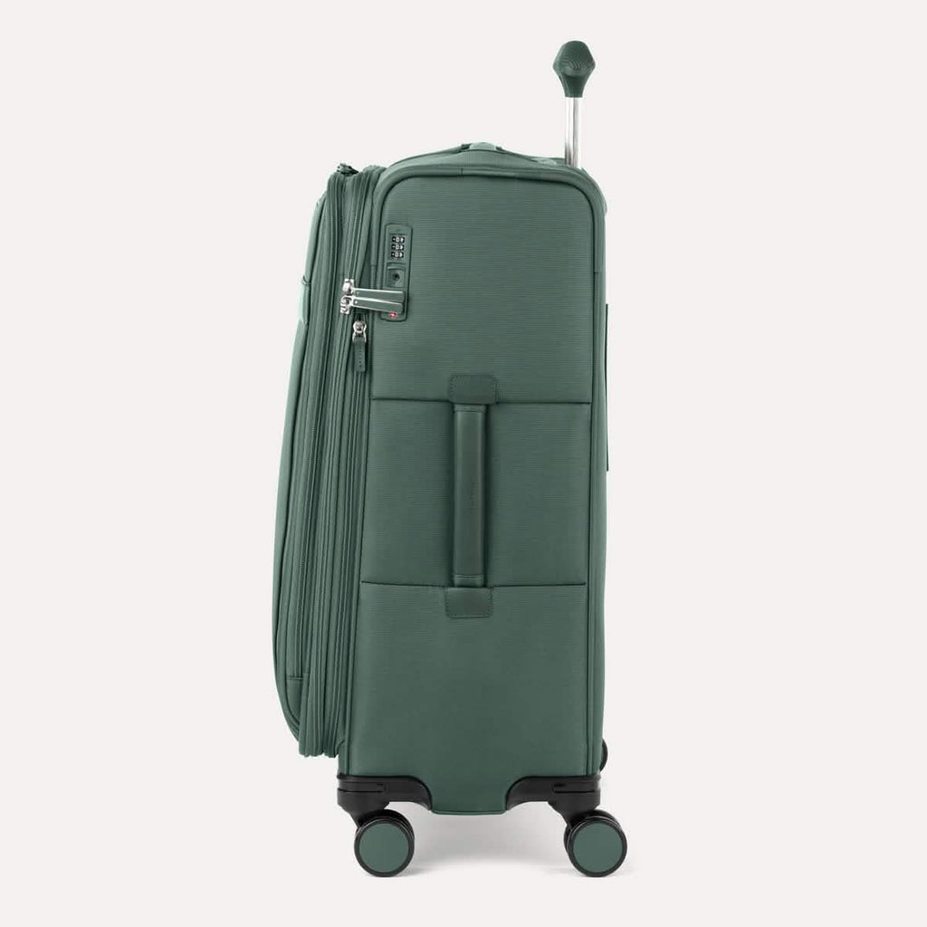 Side view of Travelpro Versapack+ Medium Check-In Spinner in Cypress Green, showing 360° spinner wheels and PowerScope Lite handle.
